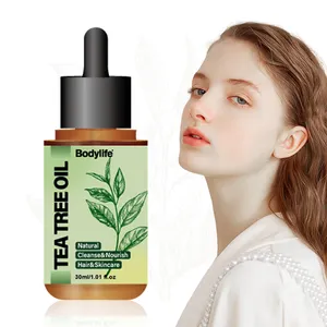 Vente en gros d'huile essentielle d'arbre à thé pour huile d'arbre à thé biologique pure pour la peau, les cheveux, le visage, l'acné et le cuir chevelu