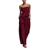 Ensemble deux pièces en lin décontracté et ample pour femme, collection été 2026, avec détails boutonnés et design créatif