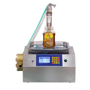 Machine à piston électrique semi-automatique pour liquides visqueux, haute productivité, pour le remplissage de bouteilles en verre (eau, miel, shampoing, thé, yaourt, lait, produits pour les ongles) - Product Image 1