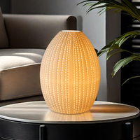 Lampe de table moderne en céramique de haute qualité en forme d'œuf avec base d'ampoule E14/E26, lumière chaude électrique pour la décoration de salon et de maison