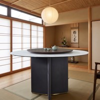 Table à manger ronde moderne de luxe pour les réunions de famille, avec plateau en marbre et base sur piédestal
