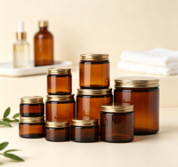 Vente en gros de pots cosmétiques en verre ambré avec couvercle en métal doré, contenants en verre vides pour bougies et crèmes, plusieurs tailles