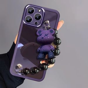 Custodia per telefono Kawaii con orsetto <span class=keywords><strong>viola</strong></span> e catena di perline nere per <span class=keywords><strong>iPhone</strong></span> 17/16/15/14/13 <span class=keywords><strong>Pro</strong></span> <span class=keywords><strong>Max</strong></span>, <span class=keywords><strong>cover</strong></span> traslucida antiurto - Product Image 1