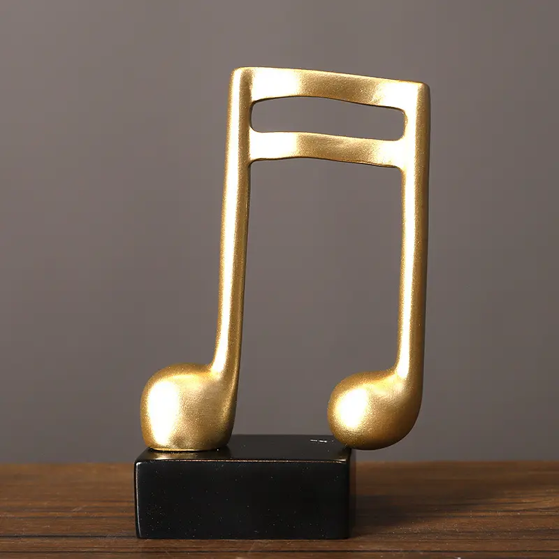 Decorazioni per accessori per la casa e il Design della statua musicale dorata in resina fabbricata su misura