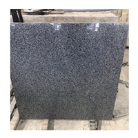 Carreaux de sol de cuisine en granit gris foncé avec un design moderne, surface polie, qualité supérieure, garantie à vie