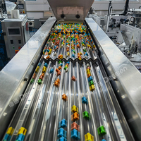 Machine automatique de comptage et d'emballage de granulés pour bonbons gélifiés, machine de remplissage et d'emballage de bonbons, machine d'emballage de comprimés effervescents