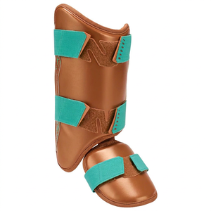 Protector de piernas de PU marrón con correas de velcro color verde azulado, protección ligera para adultos, para todas las estaciones - Product Image 1