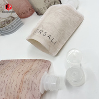 Pochette de voyage personnalisée à impression intégrale avec bouchon à clapet et bec verseur pour cosmétiques, flacon en plastique pour liquides, crèmes et lotions