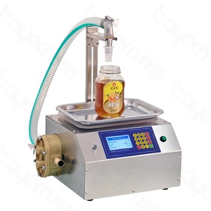 Máquina Automática de Llenado y Pesaje para Dispensar Miel, Bebidas, Perfumes, Esencias, Licores Enlatados y Cosméticos - Product Image 1