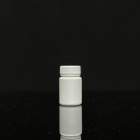 Bouchon à vis à l'épreuve des enfants personnalisable 15ml à 50ml Bouteille déshydratante en plastique HDPE avec bouchons blancs noirs pour l'emballage de médicaments