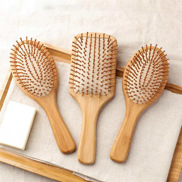 Sikat rambut dayung ramah lingkungan Logo kustom aksesori rambut sikat rambut bambu kayu alami untuk wanita