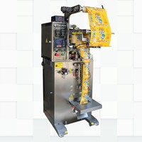 Machine d'emballage verticale de petites particules FFS à remplissage volumétrique par coupelle pour arachides, amandes et noix de cajou