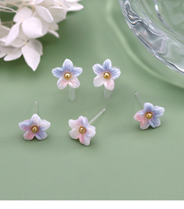 <span class=keywords><strong>Orecchini</strong></span> a clip con fiore di giglio in resina acrilica che cambiano colore reattivi ai raggi UV, si illuminano al buio, sfumatura rosa lavanda - Product Image 1