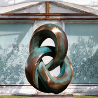 Grande sculpture abstraite en bronze torsadée et circulaire pour la décoration extérieure de jardin