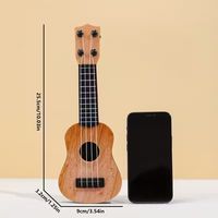Ornement de bureau en ukulélé moderne Ornement d'instrument de musique pour le salon et la chambre à coucher
