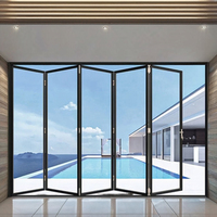 Porte coulissante pliante en accordéon française moderne en alliage d'aluminium à double vitrage imperméable CHANGYI