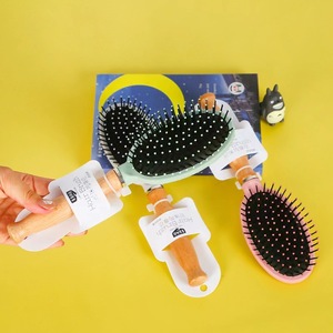Peigne à cheveux coussiné multicolores 8 cm pour coiffure professionnelle en salon - Product Image 4