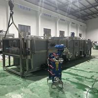 Chaîne de pasteurisation et de refroidissement par pulvérisation d'eau continue pour bouteilles PET et canettes en aluminium