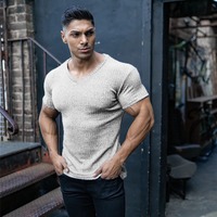 T-shirt d'été pour homme en jersey de coton, coupe ajustée, respirant, col en V, manches courtes, vêtement de sport, motif uni