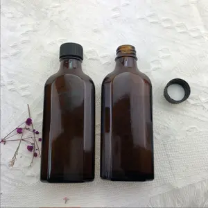 फ़ैक्टरी केसर तेल खाली पवन तेल की शीशी थाईलैंड वियतनाम औषधीय तेल की बोतल आवश्यक बाम कांच की बोतल