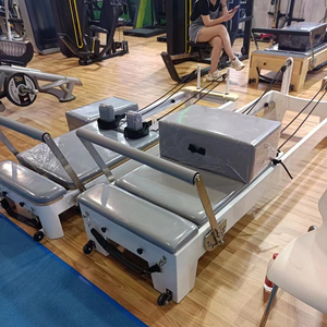 Precio de fábrica Equipo de gimnasio Pilates Cadillac Reformer Roble Wood Pilates Reformer Maple Wood Pilates reformer set para <span class=keywords><strong>Yoga</strong></span> <span class=keywords><strong>Center</strong></span> - Product Image 1