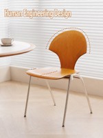 Chaise de salle à manger en acier de style mid-century, design durable, style vintage, esthétique Wabi-sabi, dossier pour usage domestique