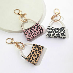 Charmes mignons en forme de mini sac à main vintage pour sacs, porte-clés en cuir à imprimé léopard, écologique, durable, cadeau du Nouvel An pour - Product Image 1