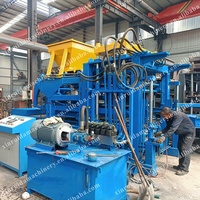 Ligne de production de briques entièrement automatique populaire, machine hydraulique de fabrication de briques en ciment, machine de fabrication de blocs de béton emboîtables