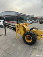 Trancheuse à chaîne montée sur tracteur pour l'installation de câbles sur les champs agricoles avec boîte de vitesses et roulement
