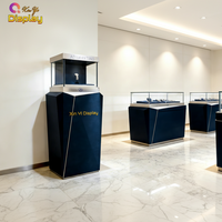 Vitrine d'exposition pour montres LED couleur personnalisable en acier inoxydable, design moderne de haute qualité, étagères réglables, conception recyclable, luxe