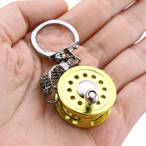 Cá mạnh mẽ bánh xe Keychain màu vàng bay quay câu cá Reel Thu nhỏ móc chìa khóa với kim loại thủ công mỹ nghệ - Product Image 3