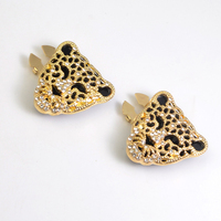 Bouton décoratif en métal personnalisé avec strass, motif léopard, fabriqué directement par APEX Button Factory, pour chemisiers et vêtements féminins.