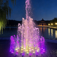 Fontaine musicale flottante moderne de conception contemporaine en acier inoxydable coloré sur mesure de 10 m de diamètre pour lac extérieur, piscine, jardin