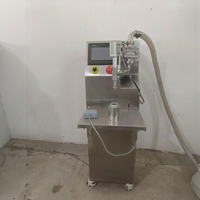 Machine de remplissage semi-automatique LGD10 avec servomoteur et pompe à engrenages pour le remplissage d'huile en bouteille