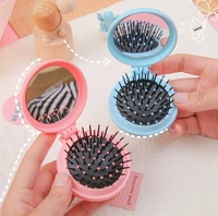 Peigne de massage pliable portable mini en ABS, couleurs bonbon, avec coussin d'air intégré et miroir pour cuir chevelu, pour femmes, usage domestique