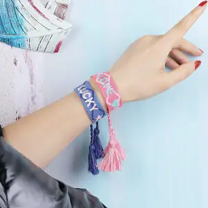 Toptan ucuz özelleştirilmiş festivali olay nakış ayarlanabilir elastik Polyester kumaş altın Vip dokuma püskül bileklik