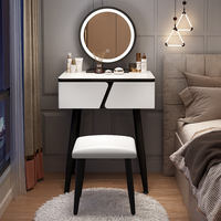 Vente en gros en usine Miroir Led rond élégant et contemporain Tiroirs de conception géométrique uniques Coiffeuse à pieds noirs