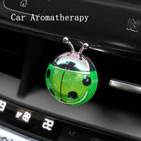 Parfum de voiture Ventilateur de climatisation pour voiture à l'intérieur de la voiture avec décoration d'aromathérapie coccinelle décorative