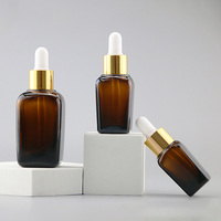 Flacon carré ambré vide de 30 ml (1 oz) pour emballage cosmétique, huile essentielle, teinture pour les yeux, sérum pour le visage avec compte-gouttes doré