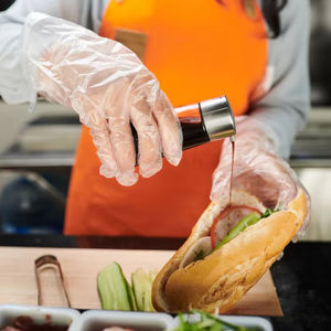 Gants jetables en plastique bleu transparent TPE, gants bon marché sans poudre, qualité alimentaire, gants en TPE - Product Image 1