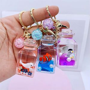 New Liquid Keychain Woman Cartoon <b>Floating</b> Key Ring Bag Car Pendant Girl Gift Keychain Accessories - Product Image 1