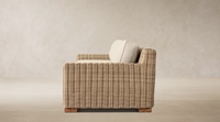 Canapé d'extérieur en osier élégant, résistant aux intempéries, avec cadre tressé à la main et coussins beiges, mobilier de salon modulaire pour jardin
