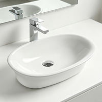 Lavabo ovale semi-encastré facile à nettoyer Lavabo de salle de bain en céramique blanche brillante pour salles de bain minimalistes
