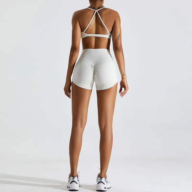 Ensembles d'entraînement pour femmes 2 pièces vêtements de Sport croisés Scrunch taille haute Booty Shorts et soutiens-gorge de sport ensembles de Yoga de gymnastique