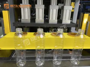 Semi Automatic 4 Cavities Bottle Blow Molding Machine 2000BPH Plastic PET Bottle Making Machine