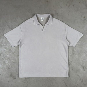 เสื้อโปโลผู้ชายแขนสั้นผ้าวาฟเฟิลสีดำ 230 แกรม แบบฟอกสีซีดจางสไตล์ Stone Acid Sun Faded พร้อมสำหรับพิมพ์ลาย DTG ตามสั่ง - Product Image 1