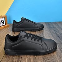 Baskets basses classiques blanches et noires pour hommes et femmes, en cuir PU, style décontracté, pour le skateboard et la marche