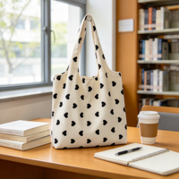 Sac fourre-tout en toile blanche avec imprimé cœur noir, sac à main décontracté à porter à l'épaule pour femmes, pour le shopping, les voyages et l'usage quotidien