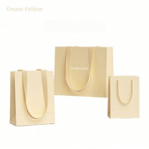 Hot Sale Custom LOGO Luxury <b>Gift</b> Boutique Packaging Shopping Clothing Paper <b>Bags</b> With Ribbon Handle - Product Image 1