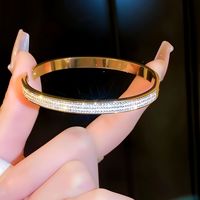 Bracelets en gros anti-décoloration plaqués or 18 carats, étanches, anti-ternissement, en titane, entièrement sertis de zircons, bijoux de mode pour femmes JianYi